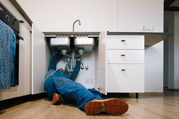 Professional Drain Cleaning technician working in Lake City, IA